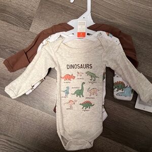 Brand new 3 pack long sleeve onsie’s